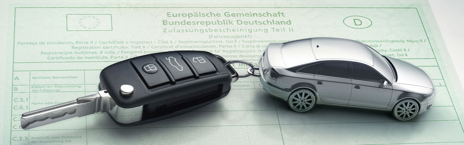 Schlüssel auf Zulassungsbescheinigung